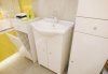 Závěsná koupelnová skříňka Tania A50 bílý lesk